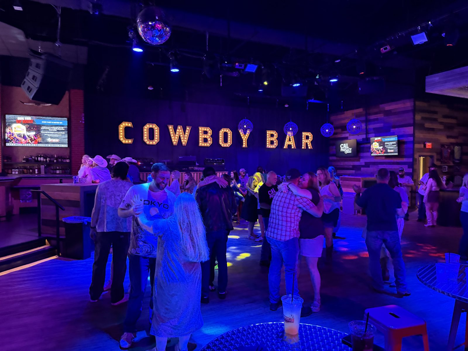 Crowd dancing at Cowboy Bar